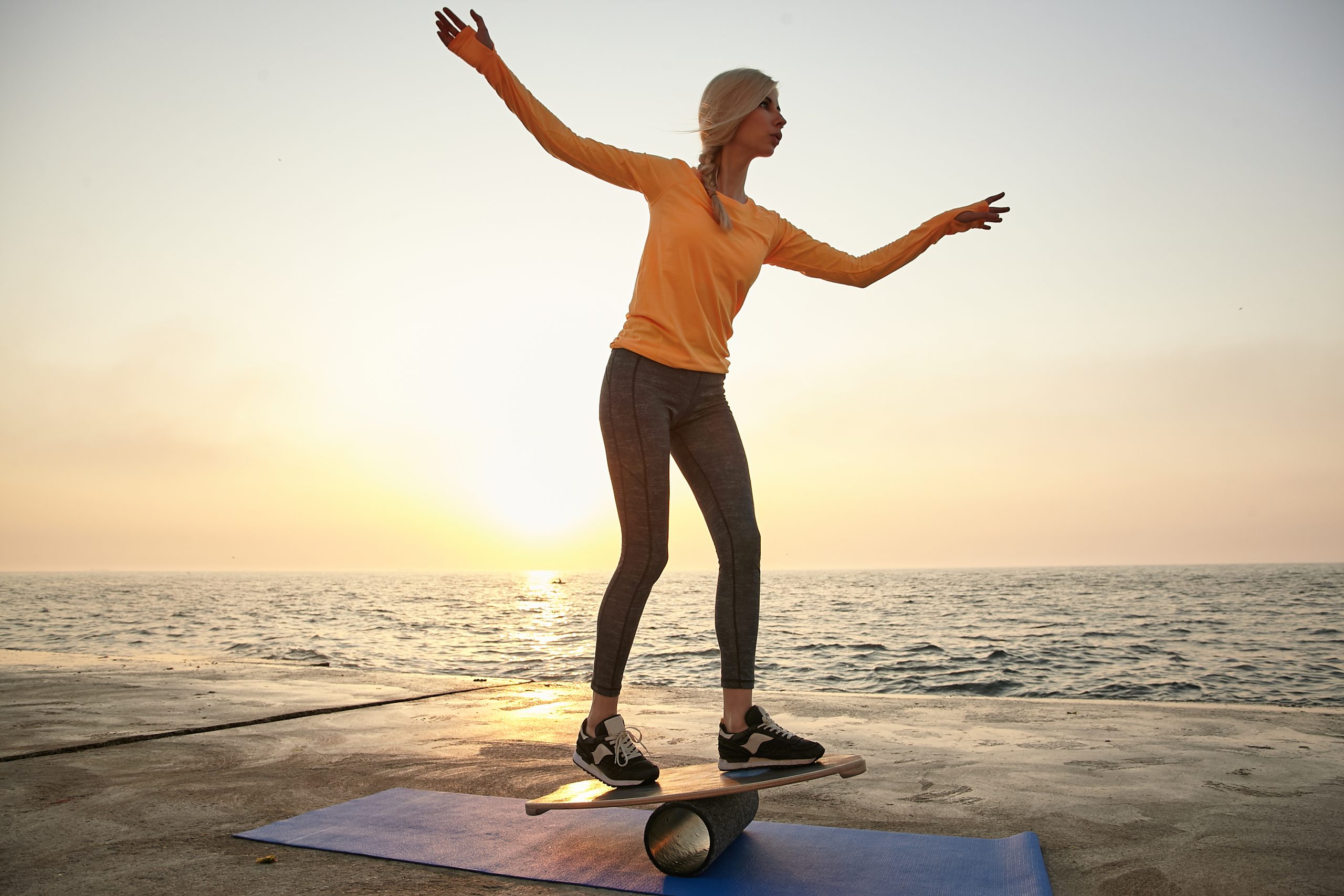 balancing lady on beach